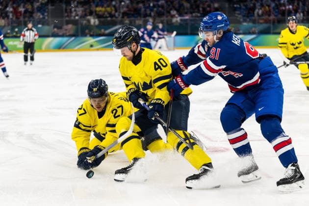 260218 Hampus Lindholm and Elias Pettersson of Sweden as well as Clayton Keller of USA in the men s Ice hockey, Eishockey quarterfinal between USA and Sweden during day 12 of the 2026 Winter Olympics on February 18, 2026 in Milan. Photo: Emma Wallskog BILDBYRAN kod EW EW0641 ishockey ice hockey Olympic Games, Olympische Spiele, Olympia, OS olympics winter olympics os ol olympiska spel vinter-os olympiske leker milano cortina 2026 milan cortina 2026 milano cortina 2026 olympic games milano cortina 2026 winter olympic games milano cortina-os milano cortina-ol vinter-ol 12 bbeng sverige sweden usa quarterfinal kvartsfinal *** 260218 Hampus Lindholm and Elias Pettersson of Sweden as well as Clayton Keller of USA in the men s ice hockey quarterfinal between USA and Sweden during day 12 of the 2026 Winter Olympics on February 18, 2026 in Milan Photo Emma Wallskog BILDBYRAN kod EW EW0641 ishockey ice hockey olympic games olympics winter olympics os ol olympiska spel vinter os olympiske leker milano cortina 2026 milan cortina 2026 milano cortina 2026 olympic games milano cortina 2026 winter olympic games milano cortina os milano cortina ol vinter ol 12 bbeng sverige sweden usa quarterfinal kvartfinal  Copyright: EMMAxWALLSKOG BB260218EW049