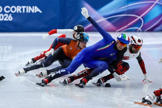 GIOCHI OLIMPICI - Olimpiadi Invernali Milano-Cortina 2026 - Short Track Speed skating, Eisschnelllauf Men s 500m Finals Maxime Laoun (CAN) and Pietro Sighel (ITA) fighting during the Olympic Winter games, Winterspiele,Spiele, Summer games Milano-Cortina 2026, Short Track Speed Skating Men s 500m Finals on February 18, 2026 at Milano Ice Skating Arena in Milan, Italy Cortina D Ampezzo Italy  Copyright: xIPAxSport ABACAx
