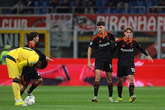 Milan, Italy, 18th February 2026. Nico Paz of Como 1907 celebrates with team mate Jacobo Ramon after scoring to give the visitors a 1-0 lead during the AC Milan vs Como 1907 Serie A match at Giuseppe Meazza, Milan. Picture credit should read: Jonathan Moscrop Sportimage EDITORIAL USE ONLY. No use with unauthorised audio, video, data, fixture lists, club league logos or live services. Online in-match use limited to 120 images, no video emulation. No use in betting, games or single club league player publications. SPI_033_MILAN_COMO_ SPI-4548-0033