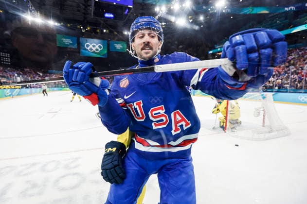 United States Vincent Trocheck (16) is checked into the boards by Sweden s Philip Broberg (6) in the first period of the Men s Hockey Playoff Quarter-final game between Sweden and the USA at the Milano Santagiulia Ice hockey, Eishockey Arena in Milan, Italy, on Wednesday, February 18, 2026.  OLY20260218323 AARONxJOSEFCZYK