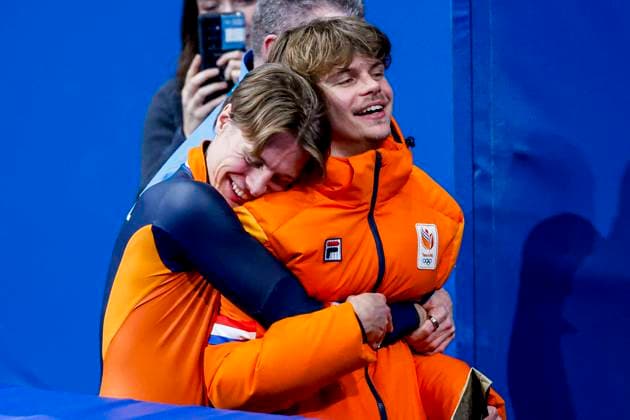 third Jens van t Wout of the Netherlands and second Melle van t Wout of the Netherlands hugs after Men s 500m Finals, Milano Cortina 2026 Winter Olympics: Day 12, Short Track Speed skating, Eisschnelllauf - Milano Cortina 2026 Winter Olympics: Day 12, Milano Speed Skating Stadium, February 18, 2026, Milan, Italy.
