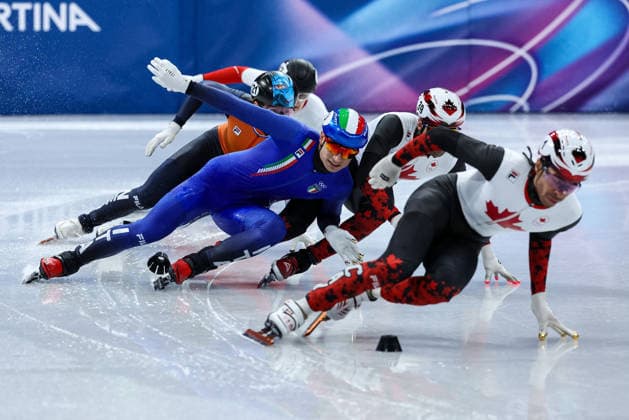 GIOCHI OLIMPICI - Olimpiadi Invernali Milano-Cortina 2026 - Short Track Speed skating, Eisschnelllauf Men s 500m Finals Maxime Laoun (CAN) and Pietro Sighel (ITA) fighting during the Olympic Winter games, Winterspiele,Spiele, Summer games Milano-Cortina 2026, Short Track Speed Skating Men s 500m Finals on February 18, 2026 at Milano Ice Skating Arena in Milan, Italy Cortina D Ampezzo Italy  Copyright: xIPAxSport ABACAx