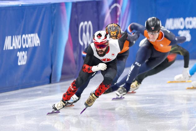 Winter Olympics - Speed skating, Eisschnelllauf Men s 500m Steven Dubois of Team Canada and Melle van T Wout of Team Netherlands compete during the Short Track Speed Skating Men s 500m on day twelve of the Milano Cortina 2026 Winter Olympic Games, Olympische Spiele, Olympia, OS at Milano Ice Skating Arena on February 18, 2026 in Milan, Italy. Photo by Alexis Jumeau ABACAPRESS.COM Milan Italy  Copyright: xJumeauxAlexis ABACAx