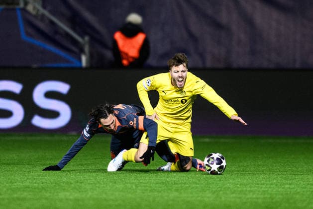 260218 Matteo Darmian of Inter and Fredrik AndrÃ Bjorkan of Bodo Glimt during the UEFA Champions League football match between Bodo Glimt and Inter on February 18, 2026 in Bodo Photo Marius Simensen BILDBYRAN COP 238 MM0055 bbeng football fotball fotboll soccer uefa champions league mesterligaen bodo glimt inter fc internazionale milano  Copyright: MARIUSxSIMENSEN BB260218ZW139
