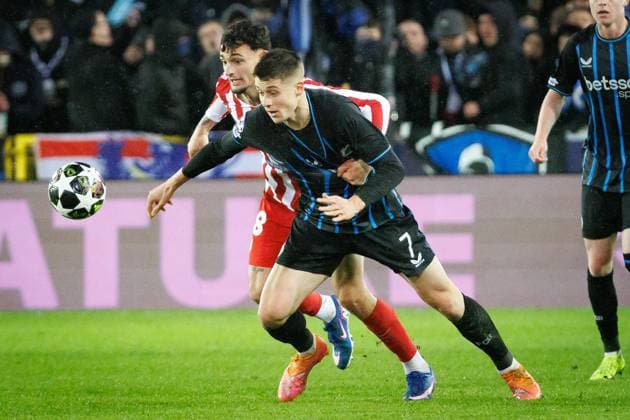 Atletico Madrid s Pablo Barrios and Club s Nicolo Tresoldi fight for the ball during a soccer game between Belgian Club Brugge KV and Spanish Atletico de Madrid, in Brugge on Wednesday 18 February 2026, the first leg of the play-offs for the knockout phase of the UEFA Champions League tournament. KURTxDESPLENTER  x164165300x