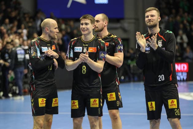 18 02 2026, xgox, Handball, EHF Champions League, SC Magdeburg GOG Handbold f l Tim Hornke Magdeburg, 17 , Manuel Zehnder Magdeburg, 8 , Tim Zechel Magdeburg, 9 , Philipp Weber Magdeburg, 20 Celebrating the victory, cheering after the end of the game Magdeburg