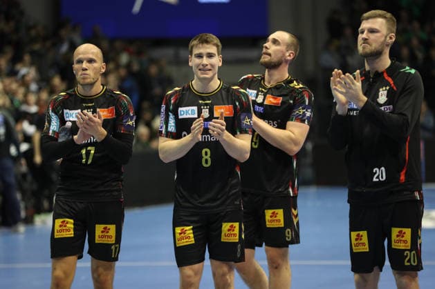 18 02 2026, xgox, Handball, EHF Champions League, SC Magdeburg GOG Handbold f l Tim Hornke Magdeburg, 17 , Manuel Zehnder Magdeburg, 8 , Tim Zechel Magdeburg, 9 , Philipp Weber Magdeburg, 20 Celebrating the victory, cheering after the end of the game Magdeburg