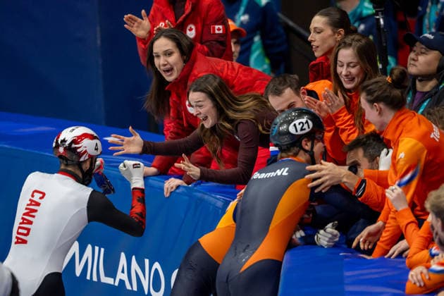 February 18, 2026, Milano, Lombardy, Italy: Steven Dubois (4) of Canada celebrate winning the gold medal and Melle van t Wout (121) of the Netherlands the silver medal in the Short Track Speed skating, Eisschnelllauf Men 500m Final during the 2026 Winter Olympics at the Milano Ice Skating Arena on Wednesday in Milano. Milano Italy - ZUMAj89_ 20260218_oly_j89_011 Copyright: xPaulxKitagakixJr.x
