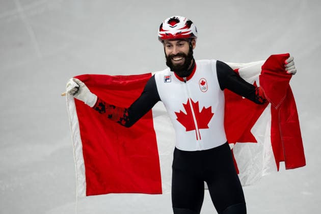 February 18, 2026, Milano, Lombardy, Italy: Steven Dubois (4) of Canada celebrate winning the gold medal in the Short Track Speed skating, Eisschnelllauf Men 500m Final during the 2026 Winter Olympics at the Milano Ice Skating Arena on Wednesday in Milano. Milano Italy - ZUMAj89_ 20260218_oly_j89_018 Copyright: xPaulxKitagakixJr.x