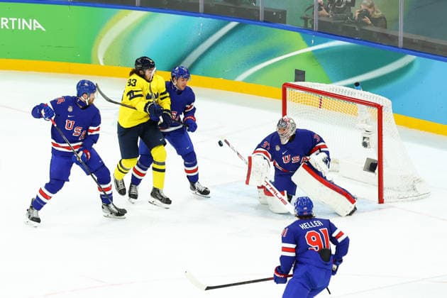 February 18, 2026, Milan, Lombardy, Italy: MIKA ZIBANEJAD 93 of Sweden shoots and sees his shot blocked by CONNOR HELLEBUYCK 37 of USA in the Quarterfinal game between Team United States (USA) and Team Sweden (SWE) at the Milano Cortina 2026 Olympic Games, Olympische Spiele, Olympia, OS Milan Italy - ZUMAc179 20260218_oly_c179_186 Copyright: xMickaelxChavetx