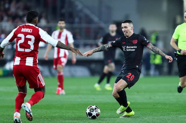 February 18, 2026, Piraeus, Piraeus, Greece: 20 ALEJANDRO GRIMALDO of Bayer Leverkusen competes with 23 RODINEI of Olympiacos during the UEFA Champions League, play-offs 1st leg game between Olympiacos and Bayer 04 Leverkusen at Georgios Karaiskakis Stadium on February 18, 2026, in Piraeus, Greece Piraeus Greece - ZUMAk160 20260218_zip_k160_010 Copyright: xStefanosxKyriazisx