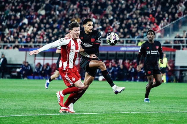 Olympiacos v Bayer Leverkusen - UEFA Champions League PIRAEUS, GREECE - FEBRUARY 18: Olympiacos player Julian Biancone in action with Bayer Leverkusen player Ibrahim Maza during the UEFA Champions League match between Olympiacos Piraeus and Bayer Leverkusen for the 2025-26 season at Karaiskaki Stadium in Piraeus, Greece, on February 18, 2026. Andreas Papakonstantinou Anadolu Piraeus Greece. Editorial use only. Please get in touch for any other usage.  Copyright: x2026xAnadoluxAndreasxPapakonstantinoux