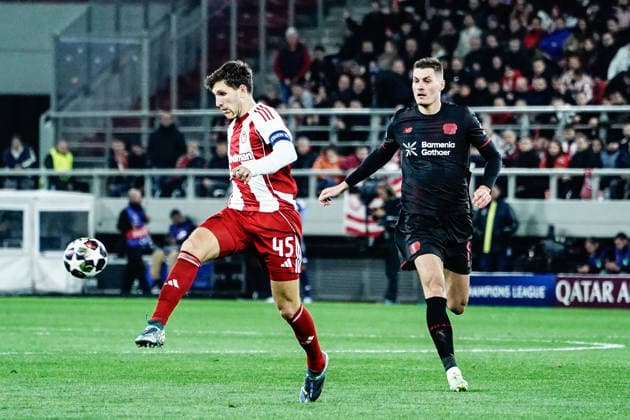Olympiacos v Bayer Leverkusen - UEFA Champions League PIRAEUS, GREECE - FEBRUARY 18: Olympiacos player Panagiotis Retsos in action with Bayer Leverkusen player Patrik Schick during the UEFA Champions League match between Olympiacos Piraeus and Bayer Leverkusen for the 2025-26 season at Karaiskaki Stadium in Piraeus, Greece, on February 18, 2026. Andreas Papakonstantinou Anadolu Piraeus Greece. Editorial use only. Please get in touch for any other usage.  Copyright: x2026xAnadoluxAndreasxPapakonstantinoux