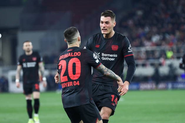 14 Patrik Schick with 20 Alejandro Grimaldo of Bayer Leverkusen celebrating a goal during the UEFA Champions League, play-offs 1st leg game between Olympiacos and Bayer 04 Leverkusen at Georgios Karaiskakis Stadium on February 18, 2026, in Piraeus, Greece.  Copyright: xStefanosxKyriazis IPAxSportx xipa-agency.netx xx IPA_71711865 IPA_Agency_IPA71711865