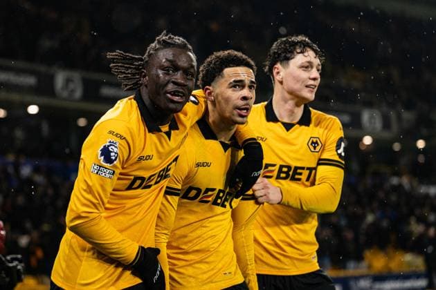 18th February 2026; Molineux Stadium, Wolverhampton, West Midlands, England; Premier League Football, Wolverhampton Wanderers versus Arsenal; Tom Edozie of Wolverhampton Wanderers celebrates with Mateus Mane and Ladislav Krejci after his shot caused the own goal by Riccardo Calafiori of Arsenal in the 4th minute of added time in the second half to make the score 2-2  GodfreyxPitt Content restricted for UK based newspaper
