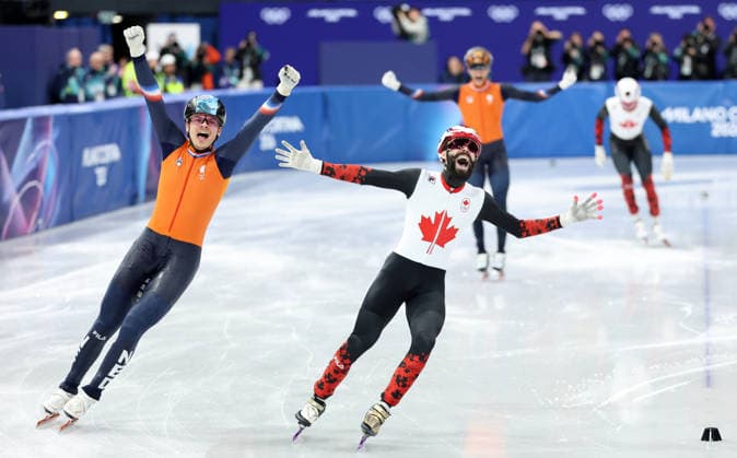 260218 -- MILAN, Feb. 18, 2026 -- Steven Dubois front of Canada celebrates after the short track Speed skating, Eisschnelllauf men s 500m final A at the Milan-Cortina 2026 Olympic Winter games, Winterspiele,Spiele, Summer games in Milan, Italy, Feb. 18, 2026. MICO2026ITALY-MILAN-OLYMPIC WINTER GAMES-SHORT TRACK SPEED SKATING-MEN S 500M-FINALS LixMing  (MICO2026)ITALY-MILAN-OLYMPIC WINTER GAMES-SHORT TRACK SPEED SKATING-MEN S 500M-FINALS IMAGO LixMing  imago images 0847990020