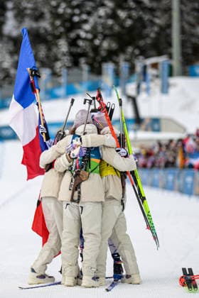(260219) -- ANTERSELVA, Feb. 19, 2026 -- Team France celebrate after the biathlon women s 4x6km relay at the 2026 Milan-Cortina Winter Olympics in Anterselva, Italy, Feb. 18, 2026. ) (MICO2026)ITALY-ANTERSELVA-OLYMPIC Winter games, Winterspiele,Spiele, Summer games BIATHLON-WOMEN S 4x6KM RELAY JiangxHan 