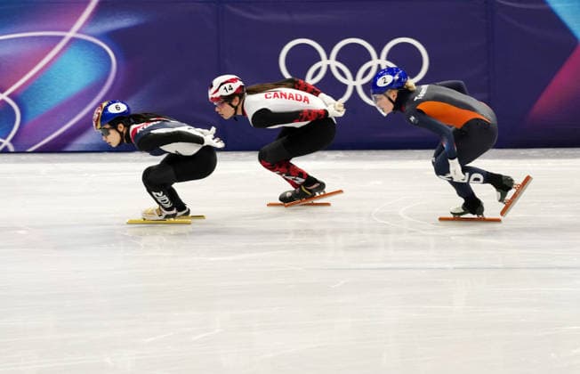 (260219) -- MILAN, Feb. 19, 2026 -- Kim Gilli (L) of South Korea, Courtney Sarault (C) of Canada and Xandra Velzeboer of the Netherlands compete during the short track Speed skating, Eisschnelllauf women s 3000m relay final A at the Milan-Cortina 2026 Olympic Winter games, Winterspiele,Spiele, Summer games in Milan, Italy, Feb. 18, 2026. ) (MICO2026)ITALY-MILAN-OLYMPIC WINTER GAMES-SHORT TRACK SPEED SKATING-WOMEN S 3000M RELAY-FINALS LaixXiangdong 