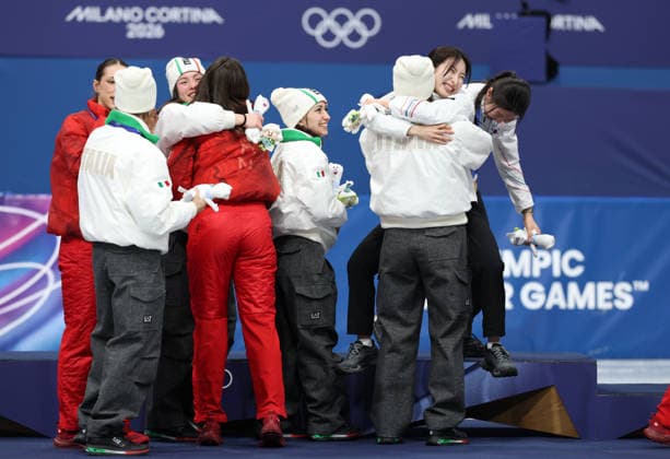 (260219) -- MILAN, Feb. 19, 2026 -- Gold medalists players of South Korea, silver medalists players of Italy and bronze medalists players of Canada hug each other during the awarding ceremony for the short track Speed skating, Eisschnelllauf women s 3000m relay final A at the Milan-Cortina 2026 Olympic Winter games, Winterspiele,Spiele, Summer games in Milan, Italy, Feb. 18, 2026. ) (MICO2026)ITALY-MILAN-OLYMPIC WINTER GAMES-SHORT TRACK SPEED SKATING-WOMEN S 3000M RELAY-FINALS LixMing 