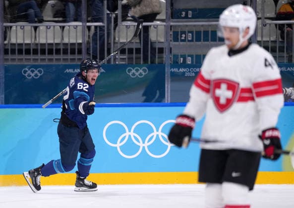 (260219) -- MILAN, Feb. 19, 2026 -- Artturi Lehkonen (L) of Finland celebrates scoring their third goal to win the Ice hockey, Eishockey men s play-offs quarterfinal between Finland and Switzerland at the Milan-Cortina 2026 Olympic Winter games, Winterspiele,Spiele, Summer games in Milan, Italy, Feb. 18, 2026. ) (MICO2026)ITALY-MILAN-OLYMPIC WINTER GAMES-ICE HOCKEY-MEN-PLAY-OFFS QUARTERFINALS-FIN VS SUI TaoxXiyi 