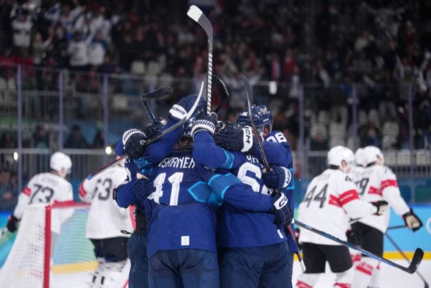 (260219) -- MILAN, Feb. 19, 2026 -- Finland s players celebrate a goal during the Ice hockey, Eishockey men s play-offs quarterfinal between Finland and Switzerland at the Milan-Cortina 2026 Olympic Winter games, Winterspiele,Spiele, Summer games in Milan, Italy, Feb. 18, 2026. ) (MICO2026)ITALY-MILAN-OLYMPIC WINTER GAMES-ICE HOCKEY-MEN-PLAY-OFFS QUARTERFINALS-FIN VS SUI TaoxXiyi 