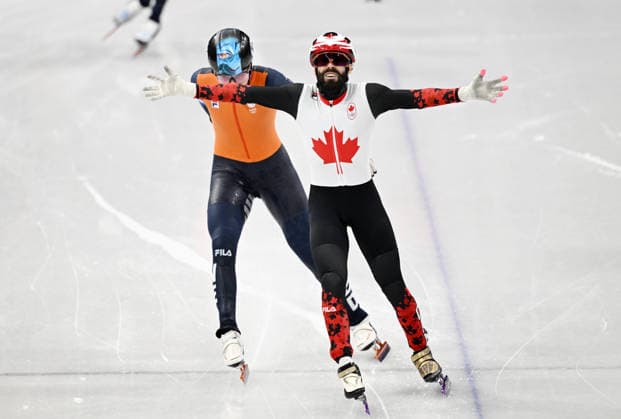 (260219) -- MILAN, Feb. 19, 2026 -- Steven Dubois (R) of Canada crosses the finish line during the short track Speed skating, Eisschnelllauf men s 500m final A at the Milan-Cortina 2026 Olympic Winter games, Winterspiele,Spiele, Summer games in Milan, Italy, Feb. 18, 2026. ) (MICO2026)ITALY-MILAN-OLYMPIC WINTER GAMES-SHORT TRACK SPEED SKATING-MEN S 500M-FINALS ChengxMin 