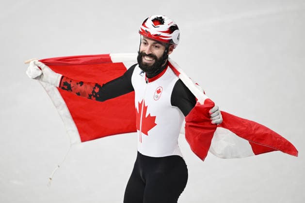 (260219) -- MILAN, Feb. 19, 2026 -- Steven Dubois of Canada celebrates after winning the short track Speed skating, Eisschnelllauf men s 500m final A at the Milan-Cortina 2026 Olympic Winter games, Winterspiele,Spiele, Summer games in Milan, Italy, Feb. 18, 2026. ) (MICO2026)ITALY-MILAN-OLYMPIC WINTER GAMES-SHORT TRACK SPEED SKATING-MEN S 500M-FINALS ChengxMin 