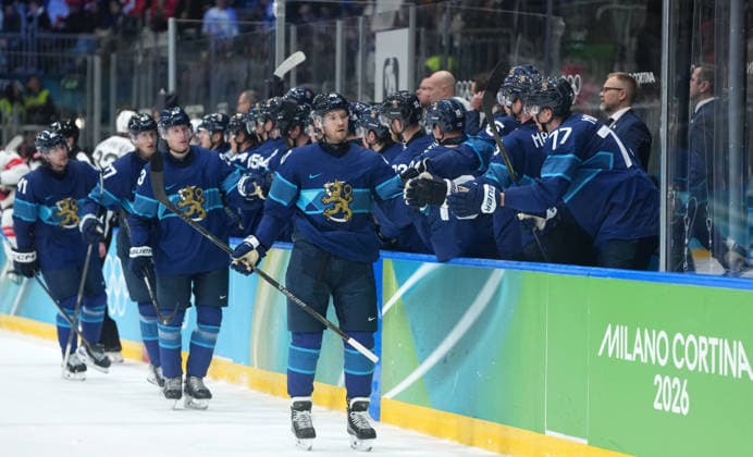 (260219) -- MILAN, Feb. 19, 2026 -- Players of Finland celebrate a goal during the Ice hockey, Eishockey men s play-offs quarterfinal between Finland and Switzerland at the Milan-Cortina 2026 Olympic Winter games, Winterspiele,Spiele, Summer games in Milan, Italy, Feb. 18, 2026. ) (MICO2026)ITALY-MILAN-OLYMPIC WINTER GAMES-ICE HOCKEY-MEN-PLAY-OFFS QUARTERFINALS-FIN VS SUI SunxFei 
