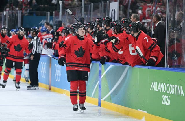 (260219) -- MILAN, Feb. 19, 2026 -- Macklin Celebrini (L) of Canada celebrates with teammates during the Ice hockey, Eishockey men s play-offs quarterfinals match between Canada and the Czech Republic at the Milan-Cortina 2026 Olympic Winter games, Winterspiele,Spiele, Summer games in Milan, Italy, Feb. 18, 2026. ) (MICO2026)ITALY-MILAN-OLYMPIC WINTER GAMES-ICE HOCKEY-MEN-PLAY-OFFS QUARTERFINALS-CAN VS CZE ZhangxHaofu 
