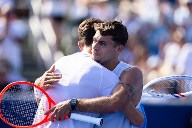 2026 Delray Beach Open - Day 3 - Flavio Cobolli (ITA) Vs Terence Atmane (FRA) Flavio Cobolli of Italy hugs at the net with Terence Atmane of France during their match on Day 3 of the Delray Beach Open at the Delray Tennis Center in Delray Beach, Florida, on February 18, 2026. Delray Beach FL United States  Copyright: xMauricioxPaizx originalFilename:paiz-2026delr260218_nper7.jpg