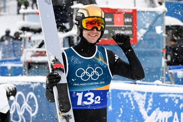LKS 20260219 Vinzenz Geiger of Germany reacts after his jump in the men s Nordic Combined Team Sprint Ski jumping, Skispringen, Ski, nordisch event at the Milano Cortina Winter Olympics at the Predazzo Ski Jumping Stadium on February 19, 2026. - MARKKU ULANDER Predazzo Italy 5DTMQ4SlTnE  Copyright: xMarkkuxUlanderx 5DTMQ4SlTnE