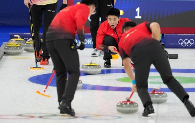 (260219) -- CORTINA D AMPEZZO, Feb. 19, 2026 -- Fei Xueqing (C) of China competes during the curling men s round robin session 12 match between China and Germany at the 2026 Milan-Cortina Winter Olympics in Cortina, Italy, Feb. 19, 2026. ) (MICO2026)ITALY-CORTINA D AMPEZZO-OLYMPIC Winter games, Winterspiele,Spiele, Summer games CURLING-MEN-ROUND ROBIN-CHN VS GER LixGang 
