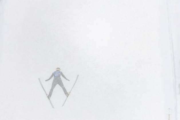 (260219) -- PREDAZZO, Feb. 19, 2026 -- Vinzenz Geiger of Germany competes during the Ski jumping, Skispringen, Ski, nordisch trial round of the nordic combined team sprint at the 2026 Milan-Cortina Winter Olympics in Predazzo, Italy, Feb. 19, 2026. ) (MICO2026)ITALY-PREDAZZO-OLYMPIC Winter games, Winterspiele,Spiele, Summer games NORDIC COMBINED-TEAM SPRINT HuangxWei 