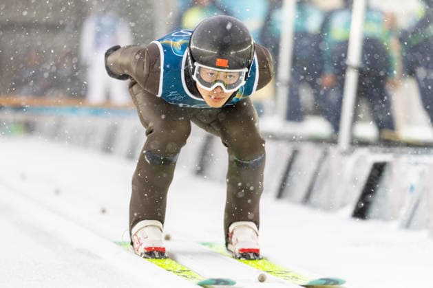 (260219) -- PREDAZZO, Feb. 19, 2026 -- Zhao Jiawen of China competes during the Ski jumping, Skispringen, Ski, nordisch trial round of the nordic combined team sprint at the 2026 Milan-Cortina Winter Olympics in Predazzo, Italy, Feb. 19, 2026. ) (MICO2026)ITALY-PREDAZZO-OLYMPIC Winter games, Winterspiele,Spiele, Summer games NORDIC COMBINED-TEAM SPRINT HuangxWei 