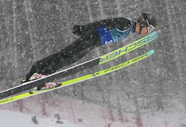 (260219) -- PREDAZZO, Feb. 19, 2026 -- Zhao Jiawen of China competes during the Ski jumping, Skispringen, Ski, nordisch competition round of the nordic combined team sprint at the 2026 Milan-Cortina Winter Olympics in Predazzo, Italy, Feb. 19, 2026. ) (MICO2026)ITALY-PREDAZZO-OLYMPIC Winter games, Winterspiele,Spiele, Summer games NORDIC COMBINED-TEAM SPRINT MengxYongmin 