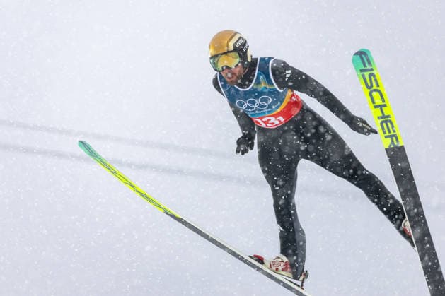 (260219) -- PREDAZZO, Feb. 19, 2026 -- Johannes Rydzek of Germany competes during the Ski jumping, Skispringen, Ski, nordisch competition round of the nordic combined team sprint at the 2026 Milan-Cortina Winter Olympics in Predazzo, Italy, Feb. 19, 2026. ) (MICO2026)ITALY-PREDAZZO-OLYMPIC Winter games, Winterspiele,Spiele, Summer games NORDIC COMBINED-TEAM SPRINT HuangxWei 