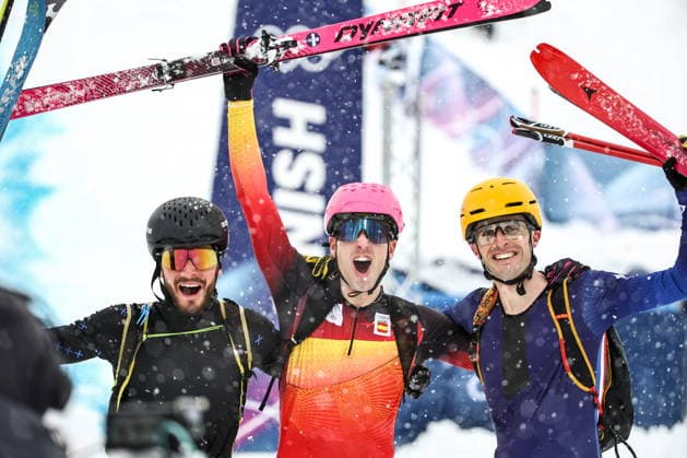 ITALY, LOMBARDY - FEBRUARY 19, 2026: Silver medalist Nikita Filippov of Russia, gold medalist Oriol Cardona Coll of Spain, and bronze medalist Thibault Anselmet (L-R) of France celebrate after the men s ski mountaineering sprint heats during the 2026 Winter Olympic Games, Olympische Spiele, Olympia, OS on the Stelvio slope of the Bormio Ski Resort in Bormio, Province of Sondrio. Mikhail Tereshchenko TASS  88947651