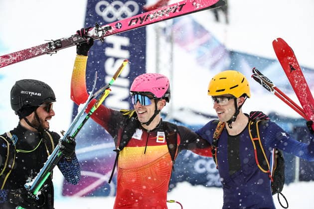 ITALY, LOMBARDY - FEBRUARY 19, 2026: Silver medalist Nikita Filippov of Russia, gold medalist Oriol Cardona Coll of Spain, and bronze medalist Thibault Anselmet (L-R) of France celebrate after the men s ski mountaineering sprint final during the 2026 Winter Olympic Games, Olympische Spiele, Olympia, OS on the Stelvio slope of the Bormio Ski Resort in Bormio, Province of Sondrio. Mikhail Tereshchenko TASS  88949057