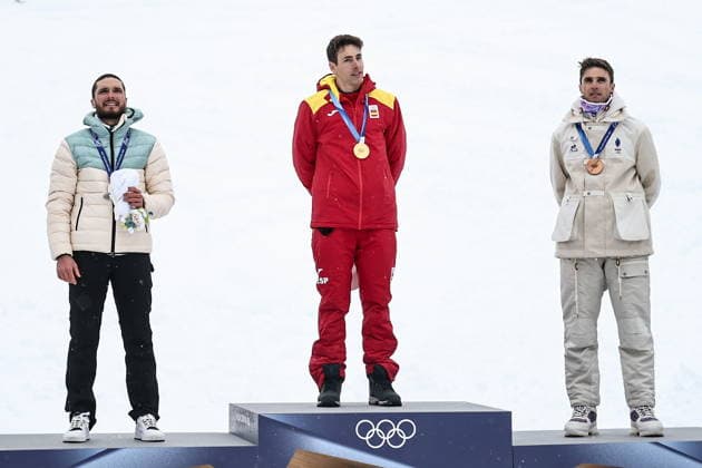 ITALY, LOMBARDY - FEBRUARY 19, 2026: Silver medalist Nikita Filippov of Russia, gold medalist Oriol Cardona Coll of Spain, and bronze medalist Thibault Anselmet (L-R) of France pose during a victory ceremony for the men s ski mountaineering sprint heats during the 2026 Winter Olympic Games, Olympische Spiele, Olympia, OS on the Stelvio slope of the Bormio Ski Resort in Bormio, Province of Sondrio 2026 Winter Olympics: Ski Mountaineering  - ZUMAt113 20260219_zaa_t113_318 Copyright: xMikhailxTereshchenkox
