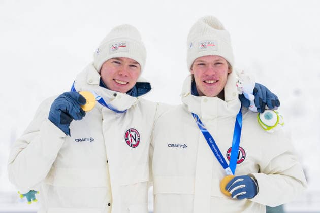 Winter Olympics in Milan Cortina 2026 Val di Fiemme, Italy 20260219. Gold medalists Jens Luraas Oftebro and Andreas Skoglund from Norway on the podium after the combined team sprint 2 x 7.5 km Tesero CC-Stadium during the Winter Olympics in Milano Cortina 2026. Photo: Lise Aaserud NTB Val di Fiemme Italy EDITORIAL USE ONLY. RESTRICTED USE FOR BETTING COMPANIES Ref:_SPOzcqFXzqS7Mo.jpg *** Winter Olympics in Milan Cortina 2026 Val di Fiemme, Italy 20260219 Gold medalists Jens Luraas Oftebro and Andreas Skoglund from Norway on the podium after the combined team sprint 2 x 7 5 km Tesero CC Stadium during the Winter Olympics in Milano Cortina 2026 Photo Lise Aaserud NTB Val di Fiemme Italy EDITORIAL USE ONLY RESTRICTED USE FOR BETTING COMPANIES  Copyright: xLisexAserudx xNTBx