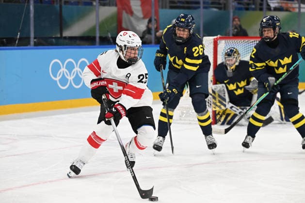 MULLER Alina (SUI) and OLSSON Hanna (SWE) during Women s Ice hockey, Eishockey - Bronze Medal - Switzerland vs Sweden, Olympic Winter games, Winterspiele,Spiele, Summer games Milano-Cortina 2026 in Milano, Italy, February 19 2026  Copyright: xFilippoxTomasi IPAxSportx xipa-agency.netx xx IPA_71732157 IPA_Agency_IPA71732157