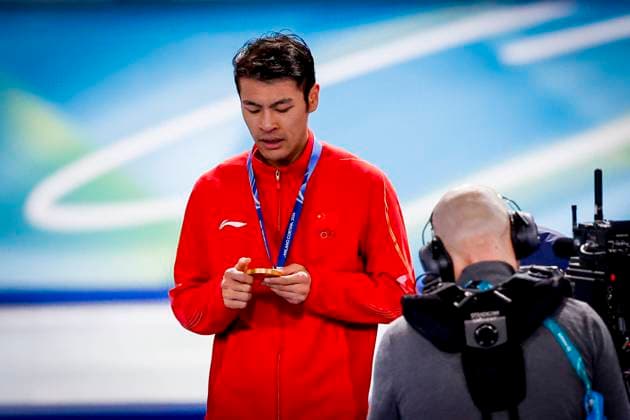 winner Zhongyan Ning of China looks on during the medal ceremony after Men s 1500m, Milano Cortina 2026 Winter Olympics: Day 13, Speed skating, Eisschnelllauf - Milano Cortina 2026 Winter Olympics: Day 13, Milano Speed Skating Stadium, February 19, 2026, Milan, Italy.
