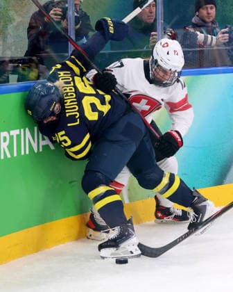 February 19, 2026, Milan, Lombardy, Italy: Lina Ljungblom 25 of Team Sweden and Lara Christen 17 of Team Switzerland in the women s Ice hockey, Eishockey bronze medal game during the Milano Cortina 2026 Olympic Winter games, Winterspiele,Spiele, Summer games at Milano Santagiulia Ice Hockey Arena. Olympics 2026: Milano Cortina: Ice Hockey-Women Finals - Bronze Medal Game-SWE V SUI  - ZUMAm117 20260219_oly_m117_011 Copyright: xDavidxMcIntyrex