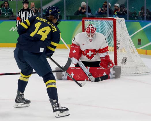 February 19, 2026, Milan, Lombardy, Italy: Ida Karlsson 14 of Team Sweden and Andrea Braendli 20 of Team Switzerland in the women s Ice hockey, Eishockey bronze medal game during the Milano Cortina 2026 Olympic Winter games, Winterspiele,Spiele, Summer games at Milano Santagiulia Ice Hockey Arena. Olympics 2026: Milano Cortina: Ice Hockey-Women Finals - Bronze Medal Game-SWE V SUI  - ZUMAm117 20260219_oly_m117_019 Copyright: xDavidxMcIntyrex