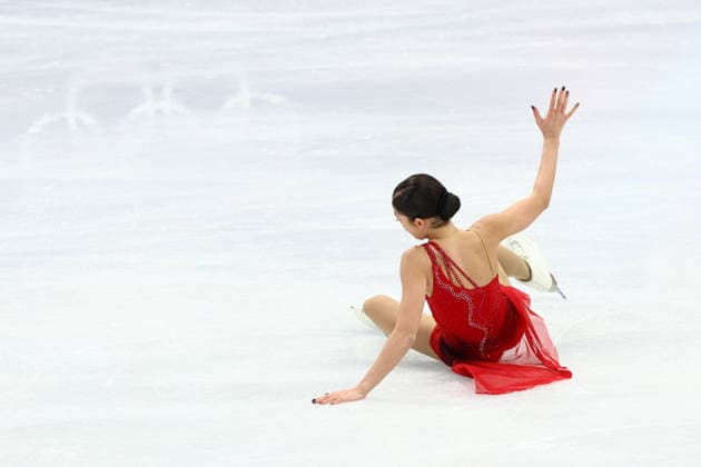 February 19, 2026, Milan, Lombardy, Italy: ADELIIA PETROSIAN of Individual Neutral Athletes (AIN) falls during the warm up before skating her Women s Single Skating free program in the Figure skating, Eiskunstlauf at the Milano Cortina 2026 Winter Olympic Games, Olympische Spiele, Olympia, OS Milan Italy - ZUMAc179 20260219_oly_c179_091 Copyright: xMickaelxChavetx
