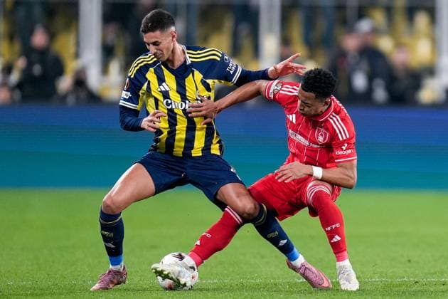 Omari Hutchinson of Nottingham Forest Football Club tackles Mert Müldür of Fenerbahce Fenerbache v Nottingham Forest, UEFA Europa League, Knockout Round Play Offs, First Leg, Football, Sukru Saracoglu Stadium, Istanbul, Turkiye - 19 Feb 2026Istanbul Sukru Saracoglu Stadium Turkey EDITORIAL USE ONLY No use with unauthorised audio, video, data, fixture lists, club league logos or live services. Online in-match use limited to 120 images, no video emulation. No use in betting, games or single club league player publications. Copyright: xRaddadxJebarah Shutterstockx 16674269az