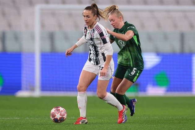 Turin, Italy, 19th February 2026. Lia Walti of Juventus is pursued by Ella Peddemors of VfL Wolfsburg during the Juventus Women vs VfL Wolfsburg Women UEFA Womens Champions League match at Juventus Stadium, Turin. Picture credit should read: Jonathan Moscrop Sportimage EDITORIAL USE ONLY. No use with unauthorised audio, video, data, fixture lists, club league logos or live services. Online in-match use limited to 120 images, no video emulation. No use in betting, games or single club league player publications. SPI_006_JUVE_WOLFSBURG_UWCL_ SPI-4527-0006