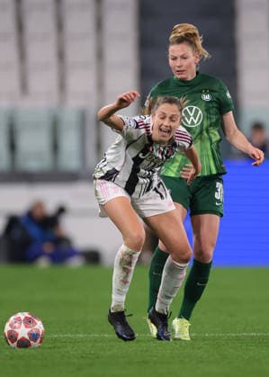 Turin, Italy, 19th February 2026. Sarai Linder of VfL Wolfsburg tussles with Emma Stolen Godo of Juventus during the Juventus Women vs VfL Wolfsburg Women UEFA Womens Champions League match at Juventus Stadium, Turin. Picture credit should read: Jonathan Moscrop Sportimage EDITORIAL USE ONLY. No use with unauthorised audio, video, data, fixture lists, club league logos or live services. Online in-match use limited to 120 images, no video emulation. No use in betting, games or single club league player publications. SPI_009_JUVE_WOLFSBURG_UWCL_ SPI-4527-0009