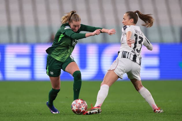 Turin, Italy, 19th February 2026. Camilla Kuver of VfL Wolfsburg takes on Lia Walti of Juventus during the Juventus Women vs VfL Wolfsburg Women UEFA Womens Champions League match at Juventus Stadium, Turin. Picture credit should read: Jonathan Moscrop Sportimage EDITORIAL USE ONLY. No use with unauthorised audio, video, data, fixture lists, club league logos or live services. Online in-match use limited to 120 images, no video emulation. No use in betting, games or single club league player publications. SPI_012_JUVE_WOLFSBURG_UWCL_ SPI-4527-0012