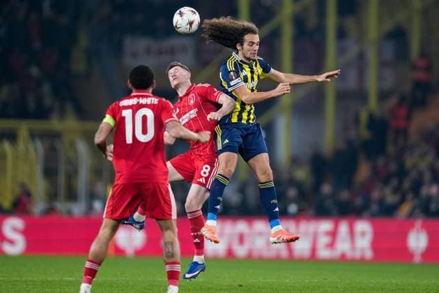 Elliot Anderson of Nottingham Forest Football Club and Mattà o Guendouzi of Fenerbahce jump to head the ball Fenerbache v Nottingham Forest, UEFA Europa League, Knockout Round Play Offs, First Leg, Football, Sukru Saracoglu Stadium, Istanbul, Turkiye - 19 Feb 2026Istanbul Sukru Saracoglu Stadium Turkey EDITORIAL USE ONLY No use with unauthorised audio, video, data, fixture lists, club league logos or live services. Online in-match use limited to 120 images, no video emulation. No use in betting, games or single club league player publications. Copyright: xRaddadxJebarah Shutterstockx 16674269cn